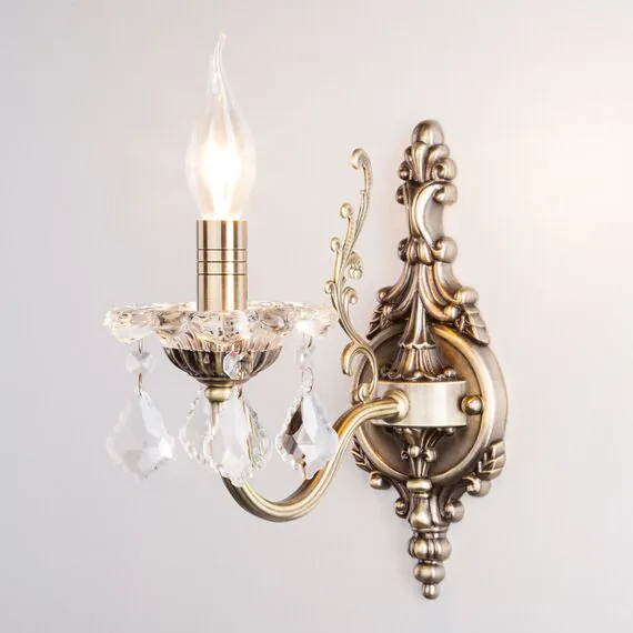 Eurosvet 00000065241 3281/1 Настенный светильник античная бронза/прозрачный хрусталь Strotskis